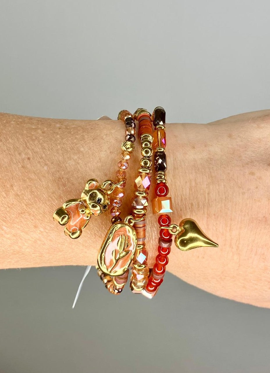 Bracciali Elasticizzati "Candy Stack" – Perline, Acciaio Dorato e Trio di Charms Set in tre pezzi