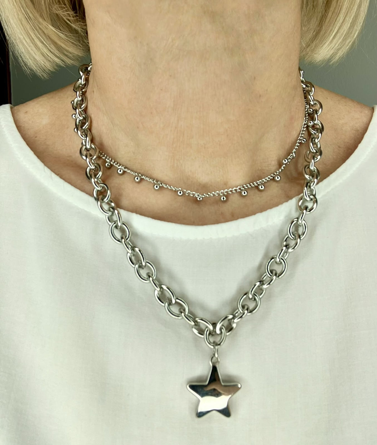 Girocollo Liquid Steel – Collana a Catena in Acciaio Lucido con Ciondolo (Cuore / Stella)